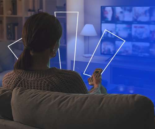 Man using phone and laptop